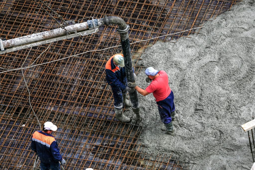 pouring and levelling of concrete represent crucial stages in constructing a foundation